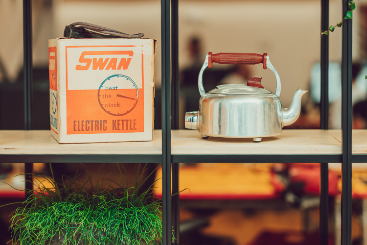 A classic Swan Brand electric kettle and packaging