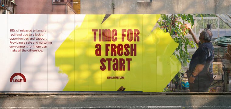 Billboard poster mock up for Langley Trust featuring a man in a garden with his back to the camera. The main headline says "Time for a fresh start" and there's a statistic that 39% of released prisoners reoffend due to a lack of opportunities and support. Providing a safe and nurturing environment for them can make all the difference. 